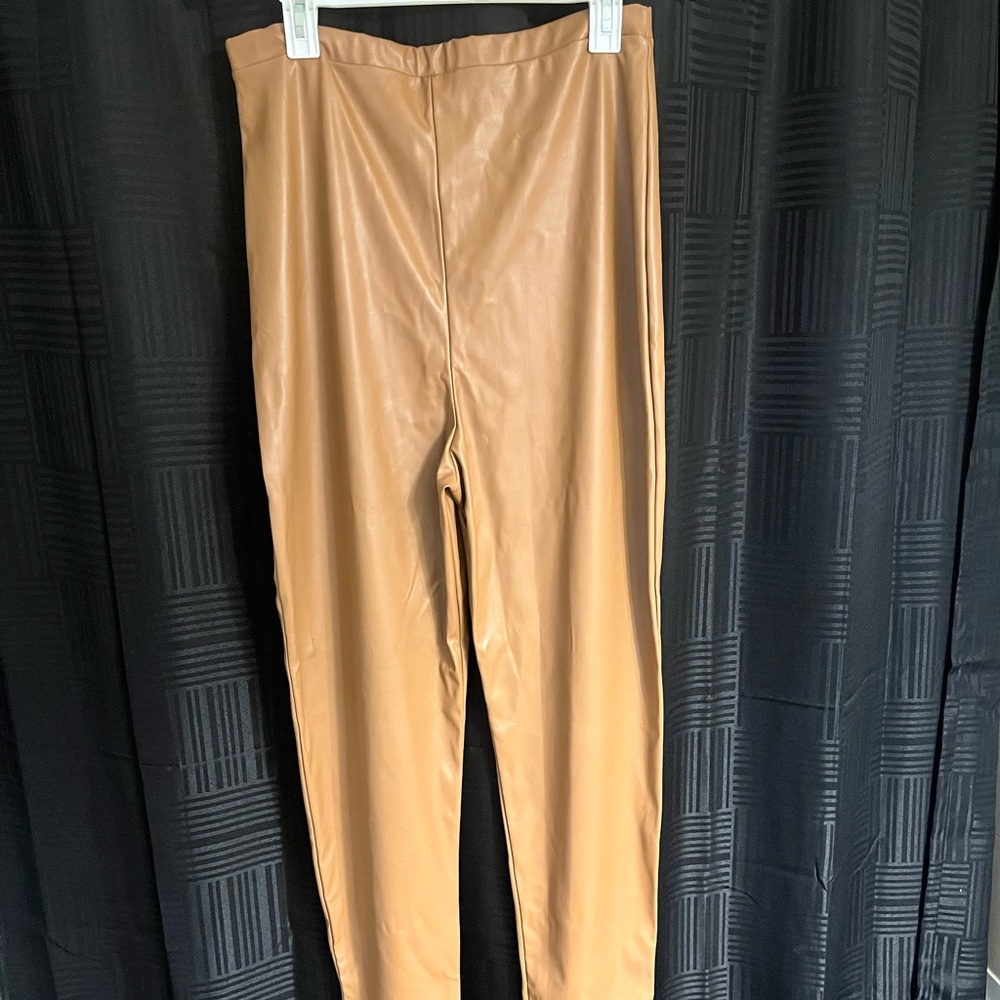 Pretty little thing leather high waisted pants with boot cut .